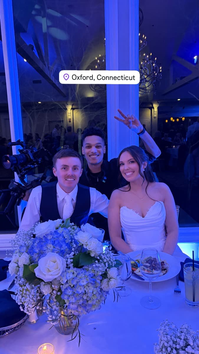 Jad with a wedding couple