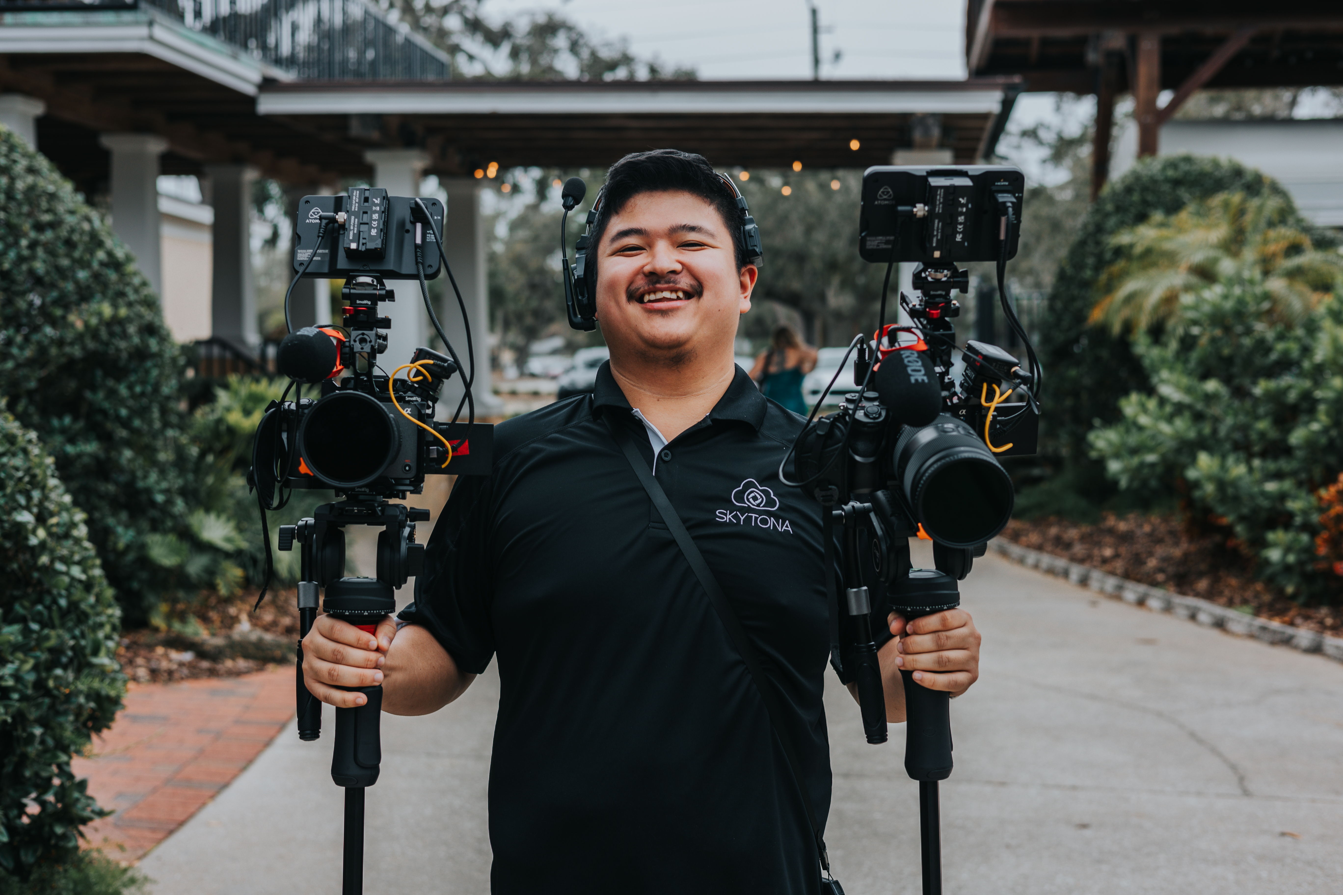 Nick filming with two cinema cameras on set